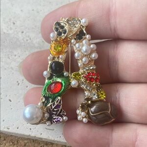 Saks Fifth Avenue Gold and White Brooch with Elegant Design